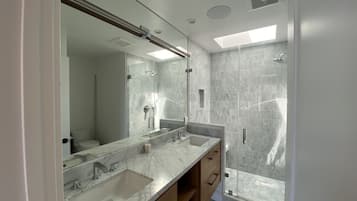 Bathtub, hair dryer, towels, soap