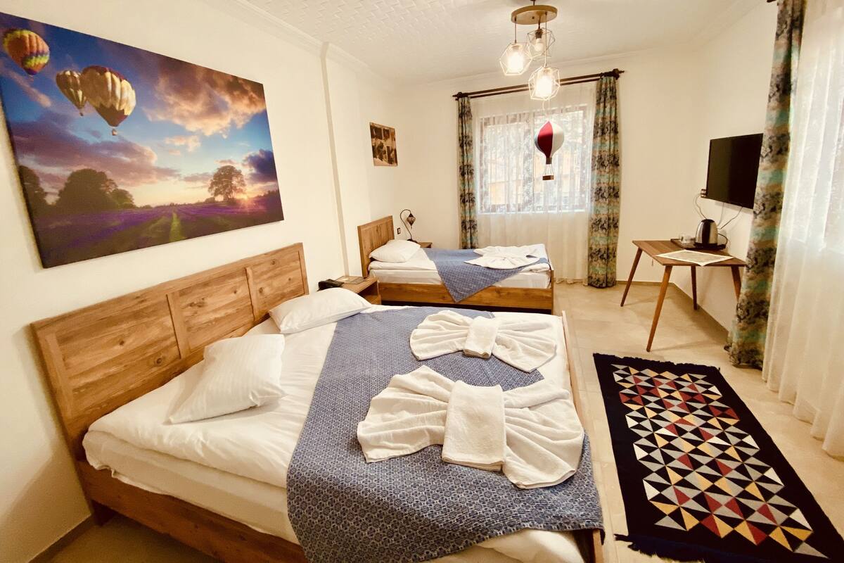 Economic Family Room | Premium bedding, desk, laptop workspace, soundproofing
