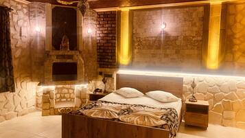 Room with Jacuzzi and Fireplace | Premium bedding, desk, laptop workspace, soundproofing