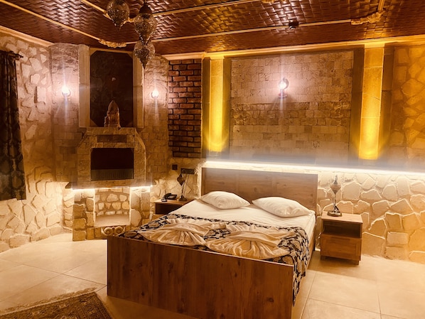 Room with Jacuzzi and Fireplace