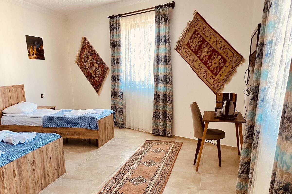 Deluxe Family Room | Premium bedding, desk, laptop workspace, soundproofing