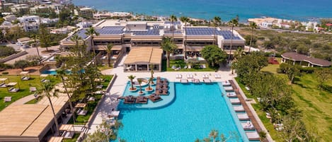 Outdoor pool, pool umbrellas, sun loungers