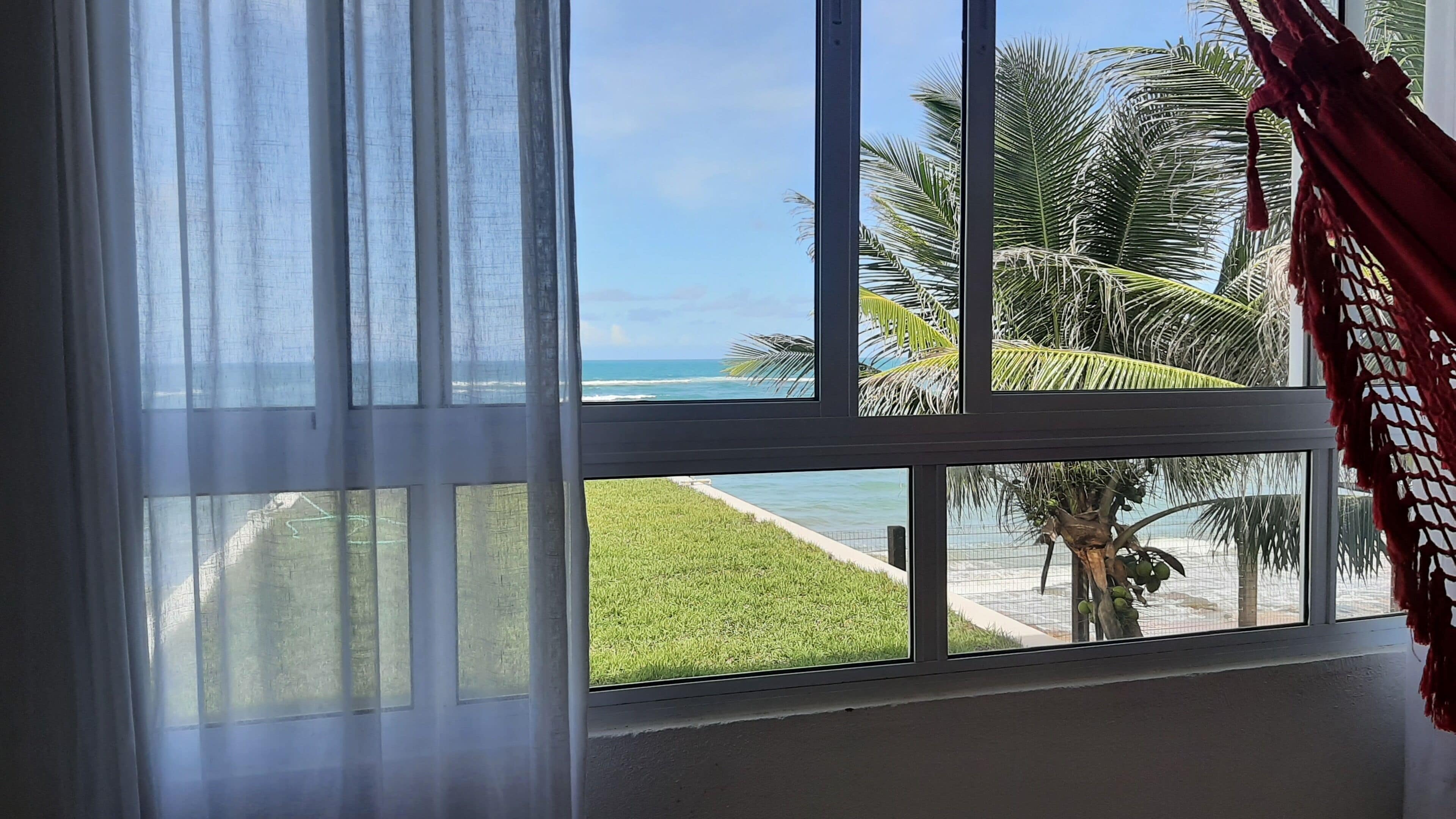 Suíte estúdio conforto, 1 cama King, vista para a praia | Roupas de cama antialérgicas, cofres nos quartos, escrivaninha