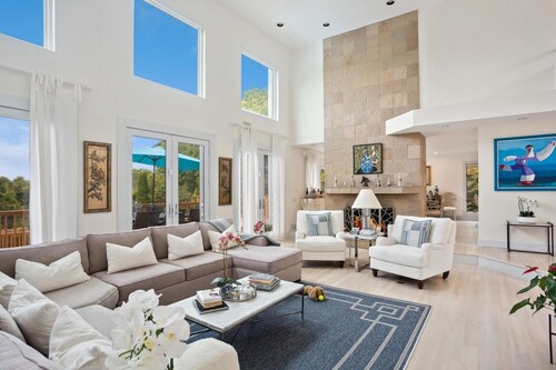 Private 2.1 acre gated home with heated pool and tennis & pickleball court