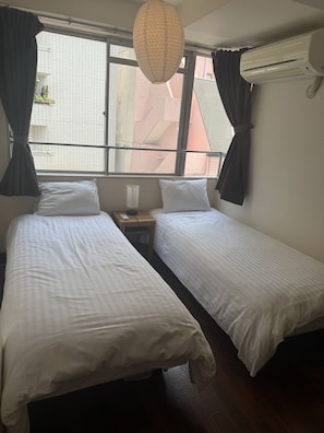 2 habitaciones, tabla de planchar con plancha y wifi gratis
