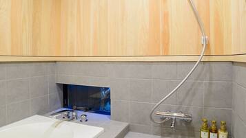 Bathtub, hair dryer, towels, soap
