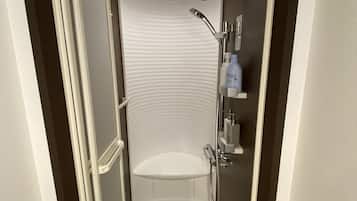 Bathtub, hair dryer, towels, soap