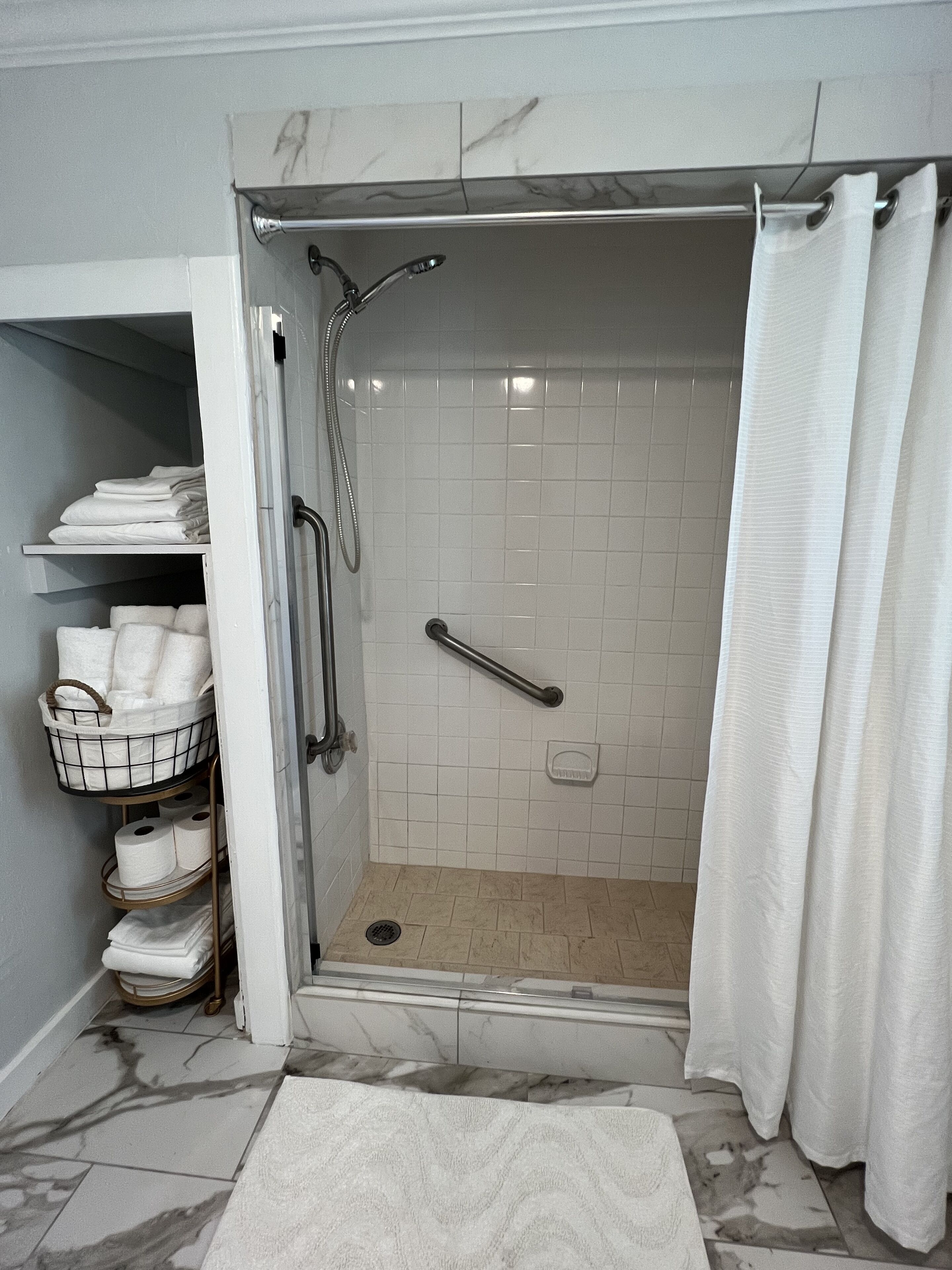 Shower, towels, soap, shampoo