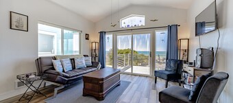 Dog-friendly oceanside home w/WiFi, ocean views, private W/D, deck, & fireplace