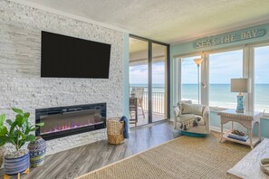 Smart TV, fireplace, books