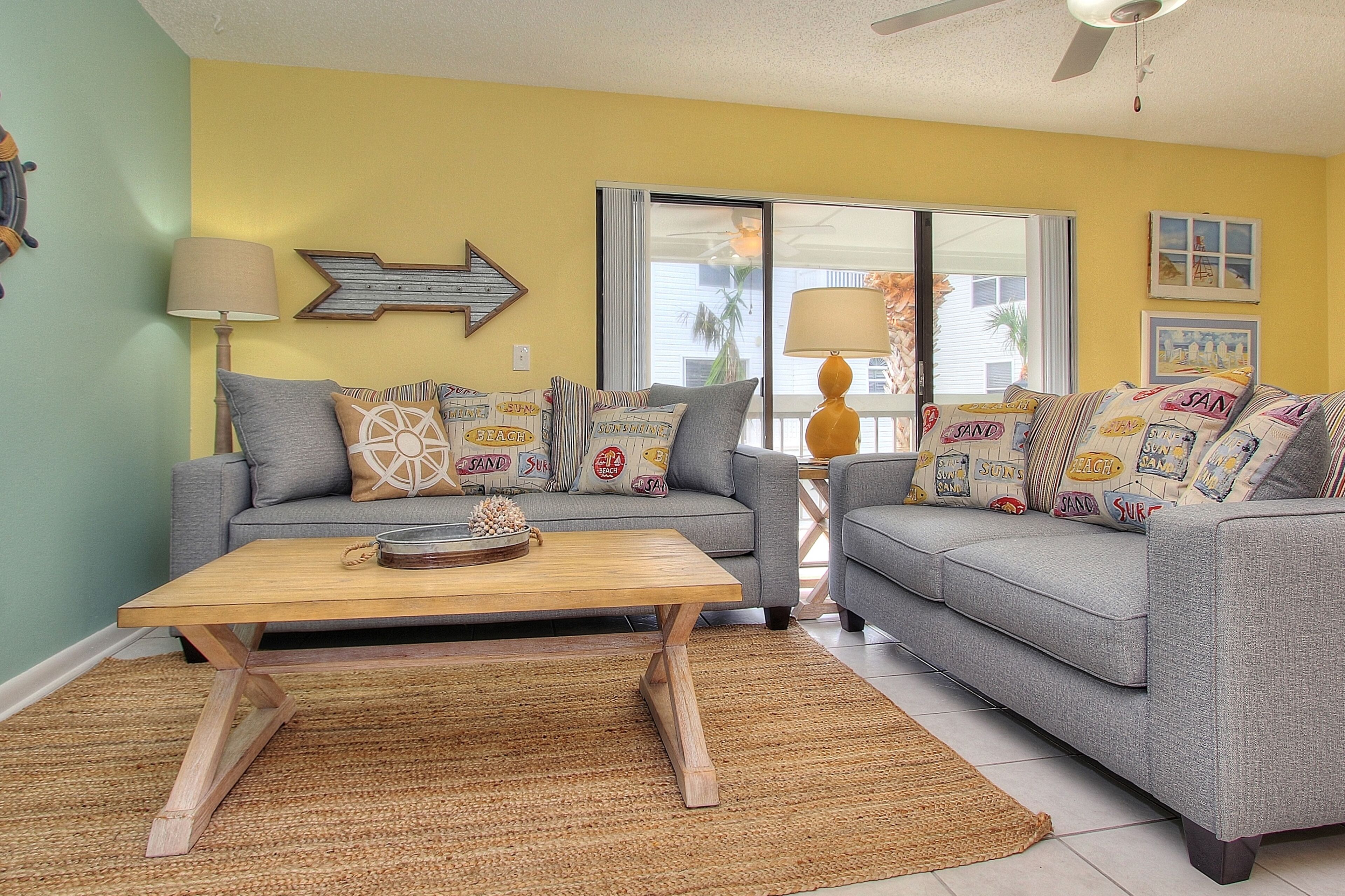 Dog-friendly, beach condo with paddleboards, pool & fishing dock - walk to sand