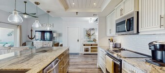 Tropical gem with pool - steps to beach - water-view balcony, private W/D & AC