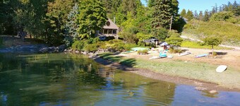 Waterfront cottage with tidelands, creek and waterfall!