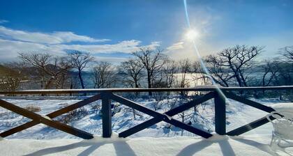 Yellow House by Lake Toya