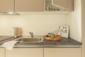 Fridge, stovetop, espresso maker, coffee/tea maker