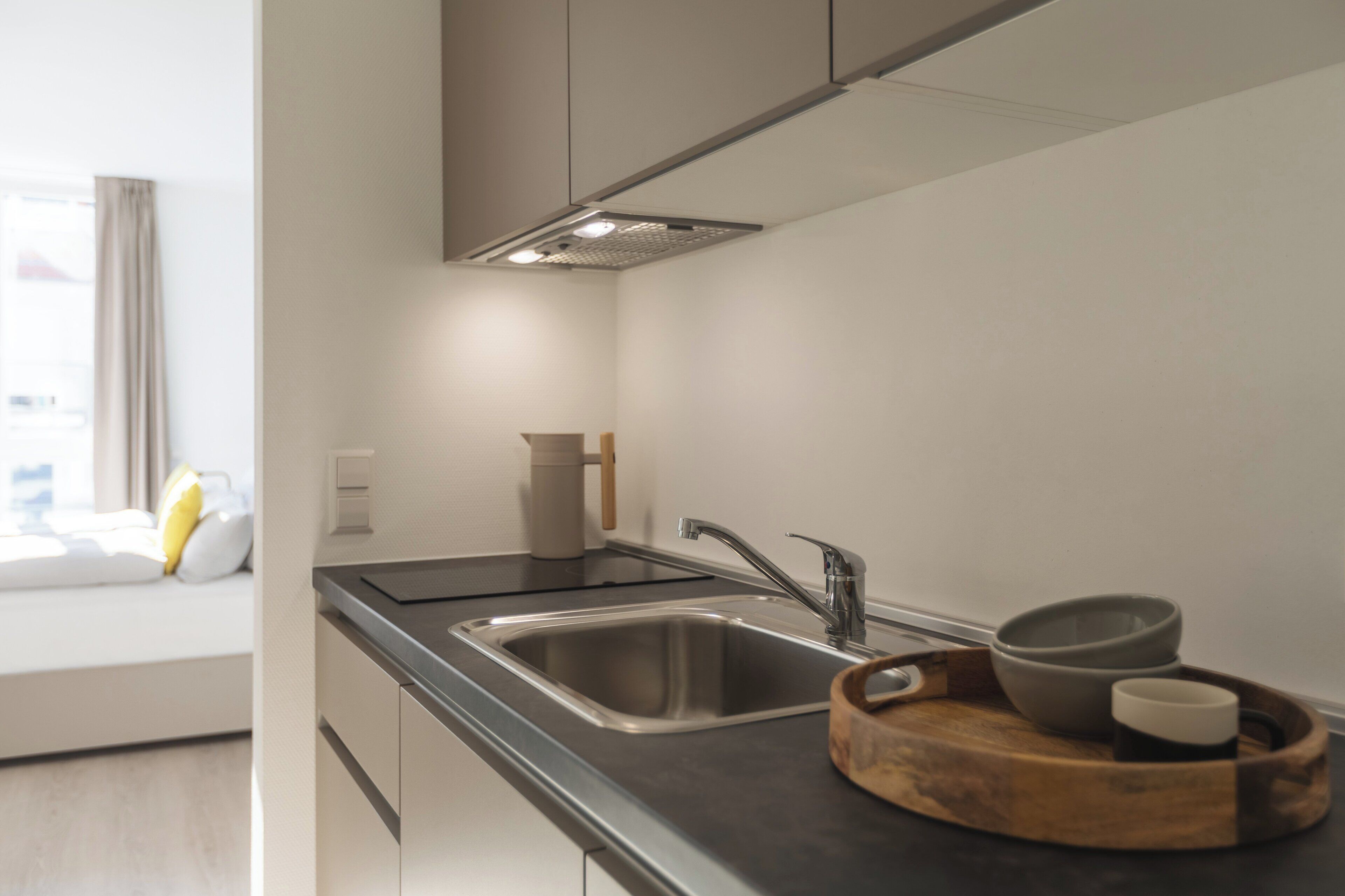 Fridge, stovetop, espresso maker, coffee/tea maker