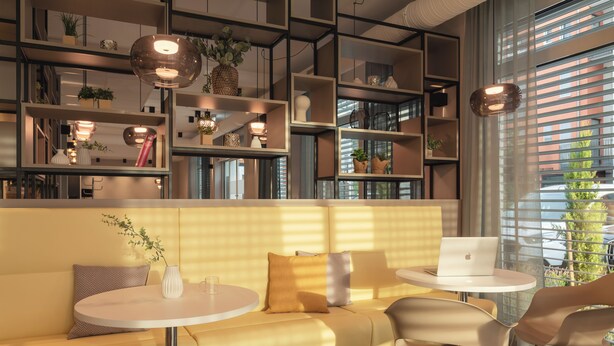 Un área de estar moderna con un sofá, mesas redondas y estantes decorados con objetos decorativos.