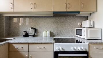 Fridge, oven, electric kettle, toaster