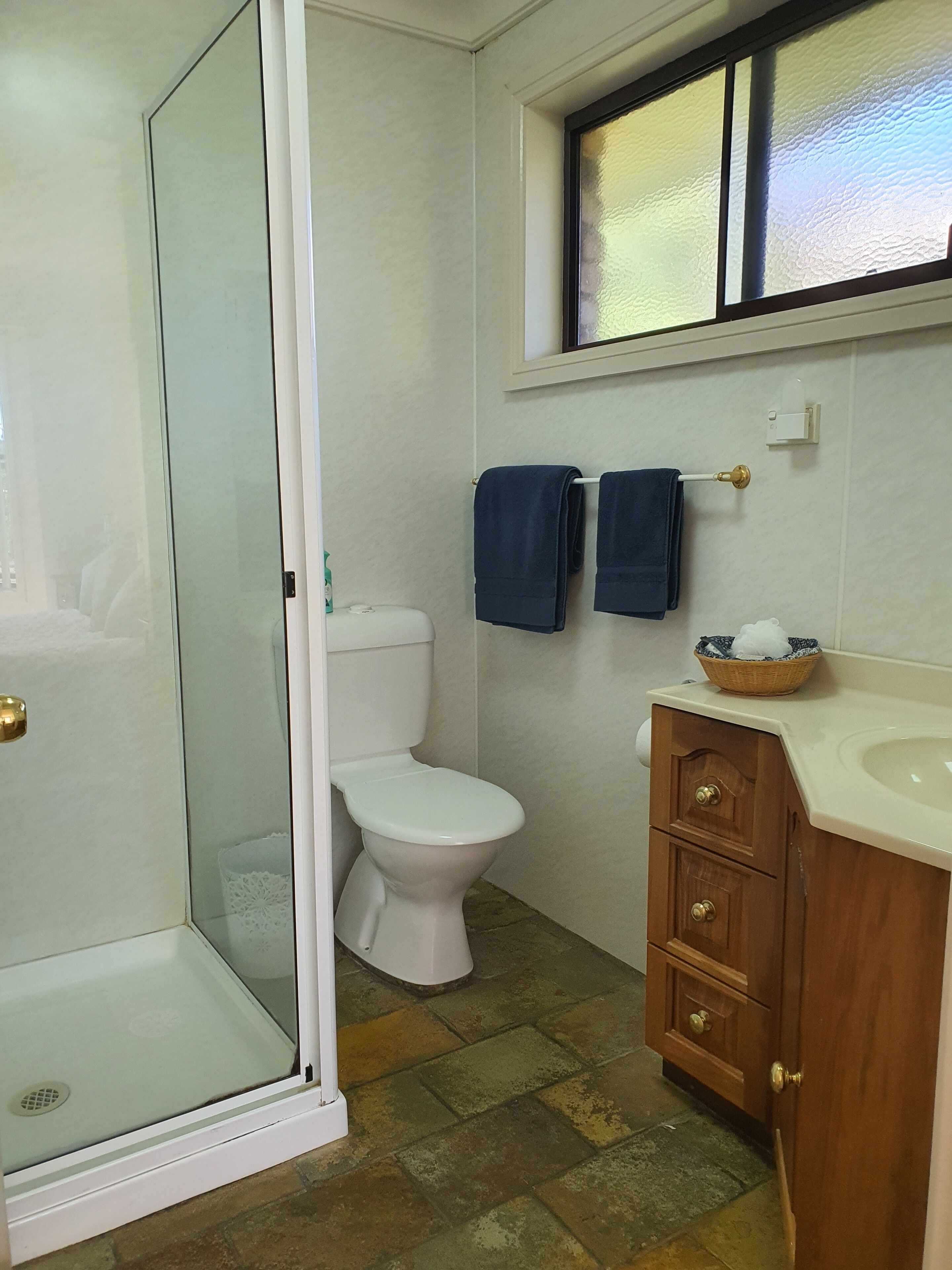 Bathtub, hair dryer, towels, soap