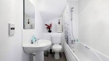 Hair dryer, towels, soap, shampoo