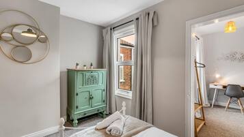 2 bedrooms, desk, iron/ironing board, travel crib