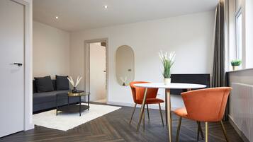 City Suite | Premium bedding, blackout drapes, soundproofing, iron/ironing board