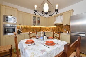 Family Villa, Multiple Bedrooms, 2 Bathrooms, Mountainside (Villa Cerbaie) | Private kitchen | Fridge, microwave, oven, stovetop