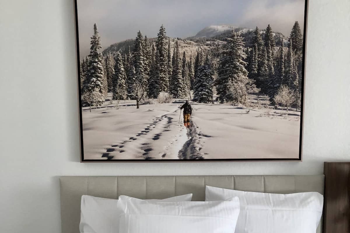 premium bedding, desk, laptop workspace, blackout curtains