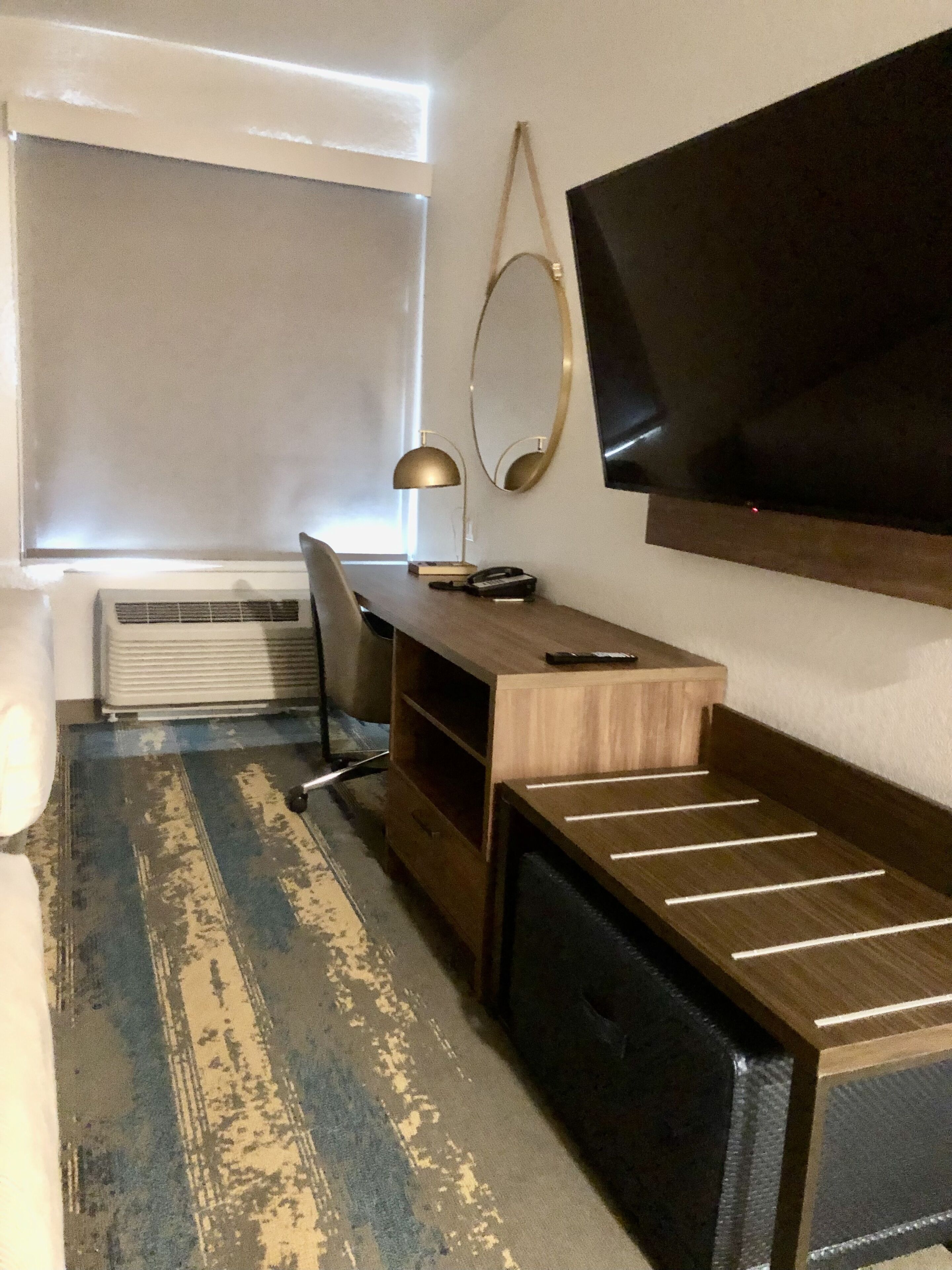 premium bedding, desk, laptop workspace, blackout curtains