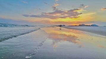 On the beach, sun loungers, beach towels