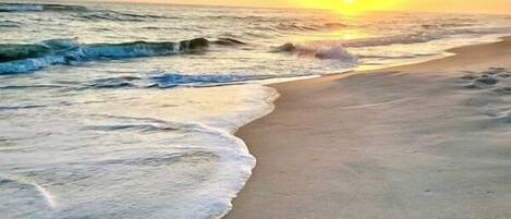 On the beach, sun-loungers, beach towels