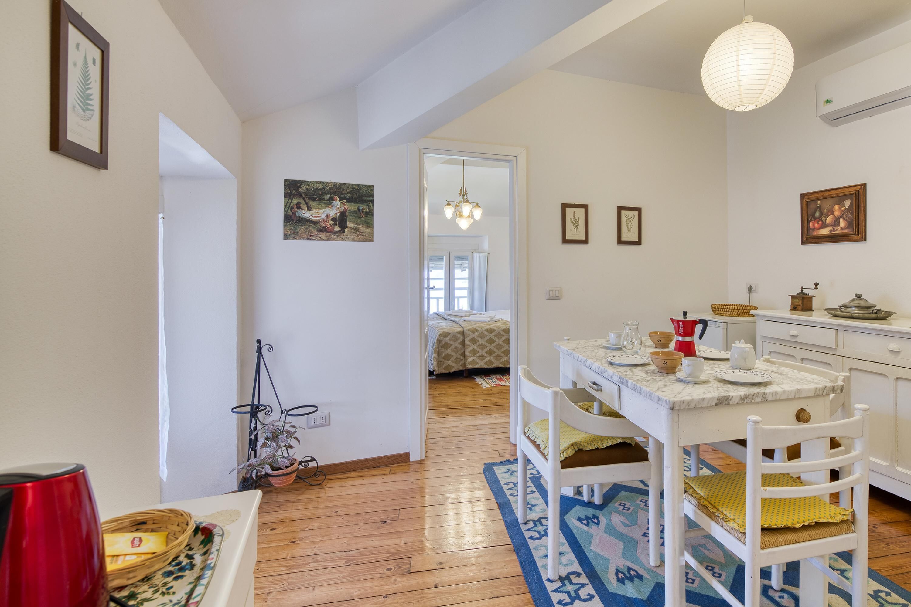 Family Apartment, Multiple Bedrooms, Mountainside (Piccolo Mondo Antico Stunning View) | Dining