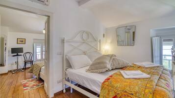 Family Apartment, Multiple Bedrooms, Mountainside (Piccolo Mondo Antico Stunning View) | 2 bedrooms, free WiFi, bed sheets