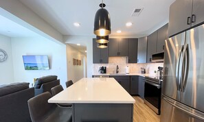 Fridge, microwave, oven, stovetop - Downtown Two Suite Penthouse 411 (Traverse City)