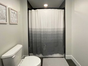 Bathtub, hair dryer - Downtown Two Suite Penthouse 413 (Traverse City)