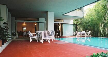 FURNISHED 2 BEDROOM POOL APARTMENT IN UPSCALE RESIDENTIAL AREA