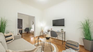 Habitación doble urbana | Área de sala de estar | Oficina