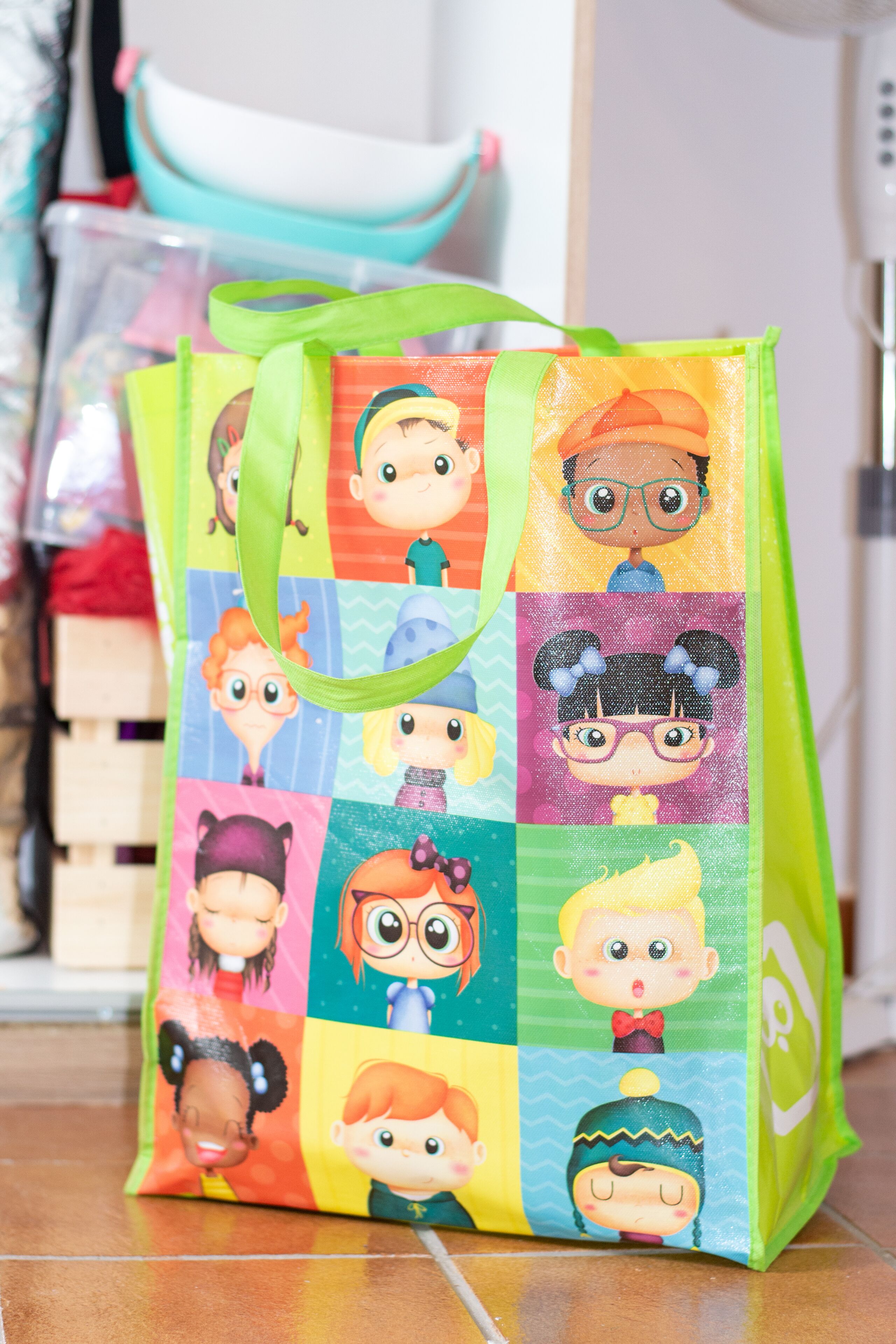 A colorful bag with cartoon characters on it.