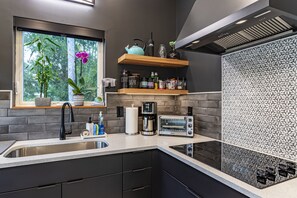 Fridge, microwave, stovetop, coffee/tea maker