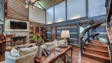 Smart TV, fireplace, books, stereo