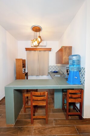 Family Quadruple Room, 1 Bedroom | Private kitchen | Mini-fridge, microwave, stovetop, blender