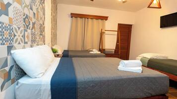 Family Quadruple Room, 1 Bedroom | Blackout curtains, iron/ironing board, free WiFi, bed sheets