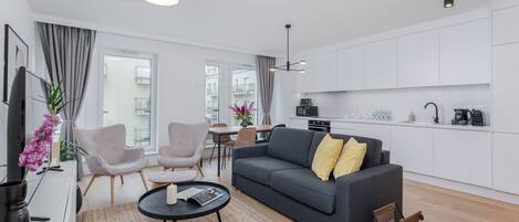 Executive Apartment, 2 Bedrooms | Living area | 55-inch LED TV with cable channels, TV, Netflix