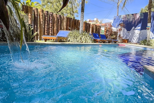 Outdoor pool, open 9:00 AM to 9:00 PM, pool umbrellas, pool loungers