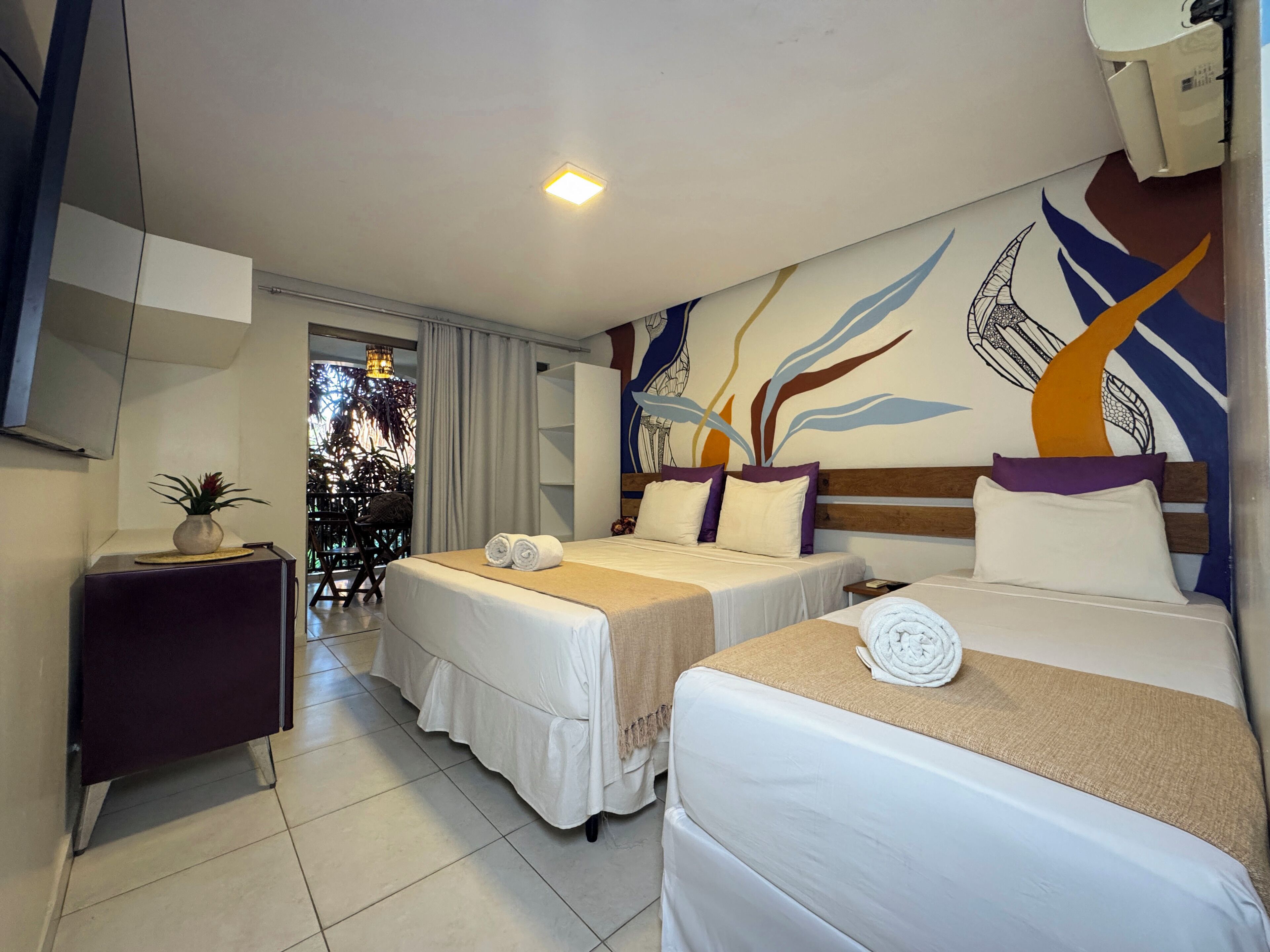 Deluxe Triple Room | Minibar, free WiFi