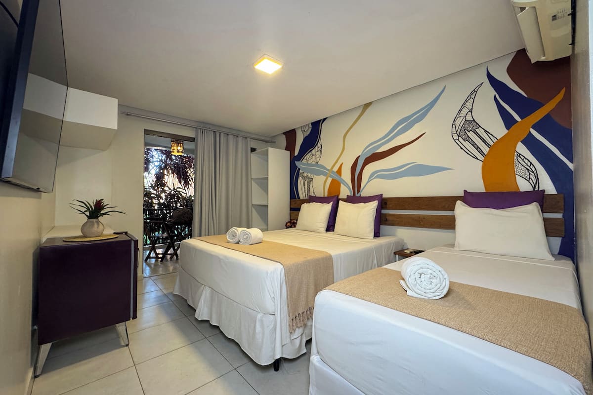 Habitación triple Deluxe | Minibar y wifi gratis