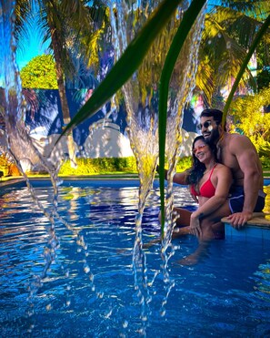 Outdoor pool, open 9:00 AM to 9:00 PM, pool umbrellas, sun loungers