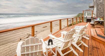 Enjoy the beach from this Ocean Front home with a Hot Tub and Large Deck