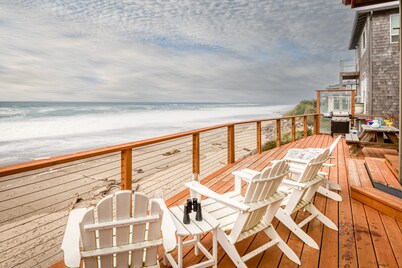 Enjoy the beach from this Ocean Front home with a Hot Tub and Large Deck