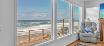 Enjoy the beach from this Ocean Front home with a Hot Tub and Large Deck